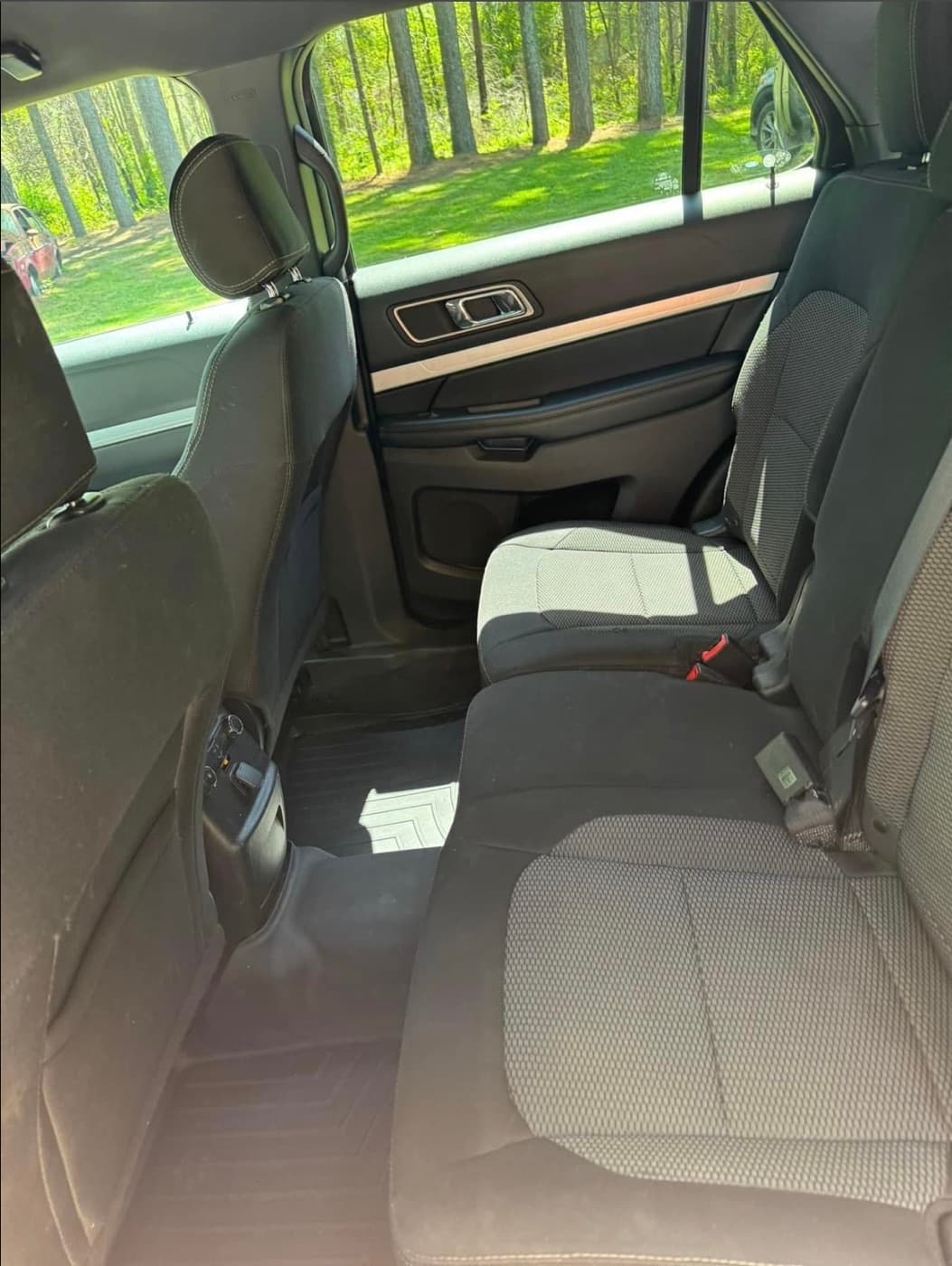 Ford Explorer second-row seats vacuumed and cleaned